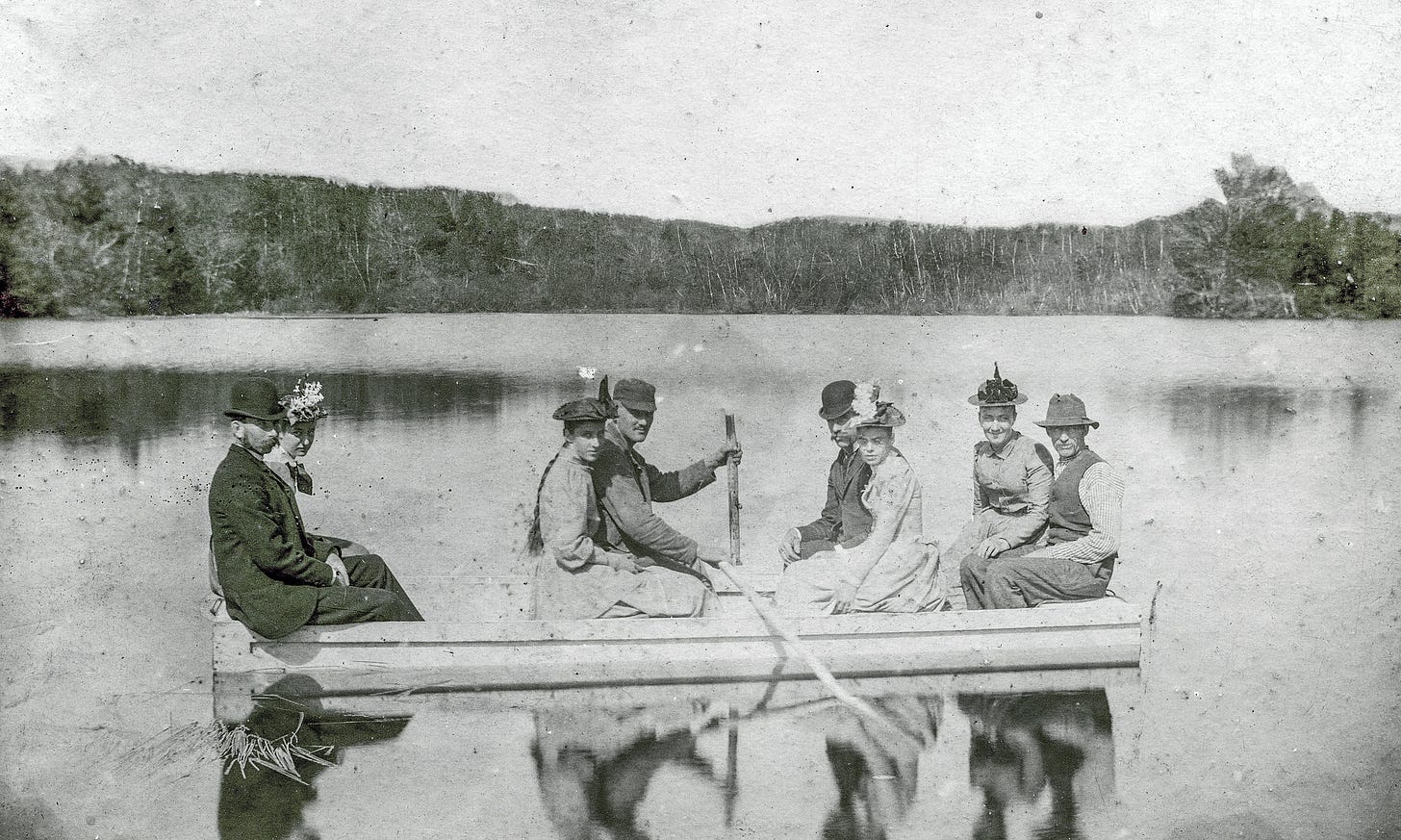 Eight people in boat on Balch Pond