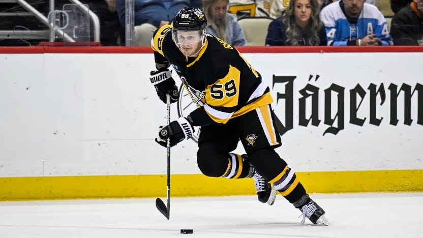 Guentzel handling the puck