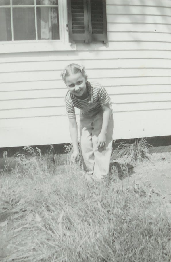 Girl on grassy lawn