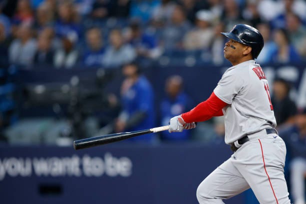 Rafael Devers of the Boston Red Sox at bat during the first inning of their MLB game against the Toronto Blue Jays at Rogers Centre on September 15,...