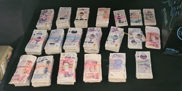 Thousands of pounds found in the car boot of a drug dealer