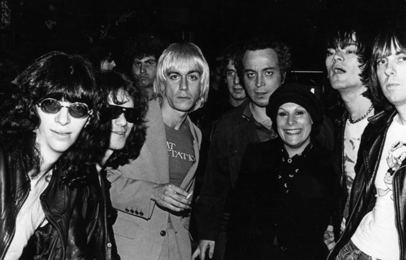 Seymour Stein with the Ramones, Iggy Pop, Linda Stein and Danny Fields in the background.