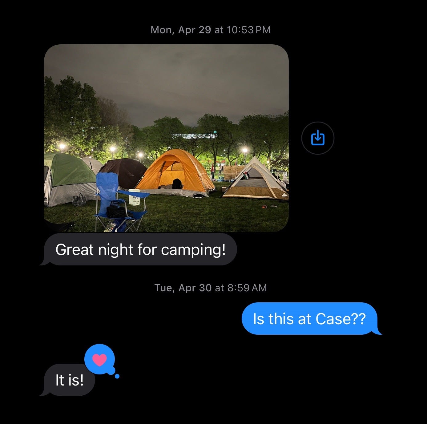 A text message from S with a photo of the encampment and the message “Great night for camping!”