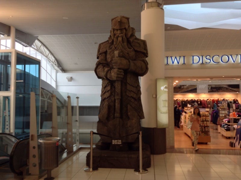 A large sculpture of a warrior from LOTR