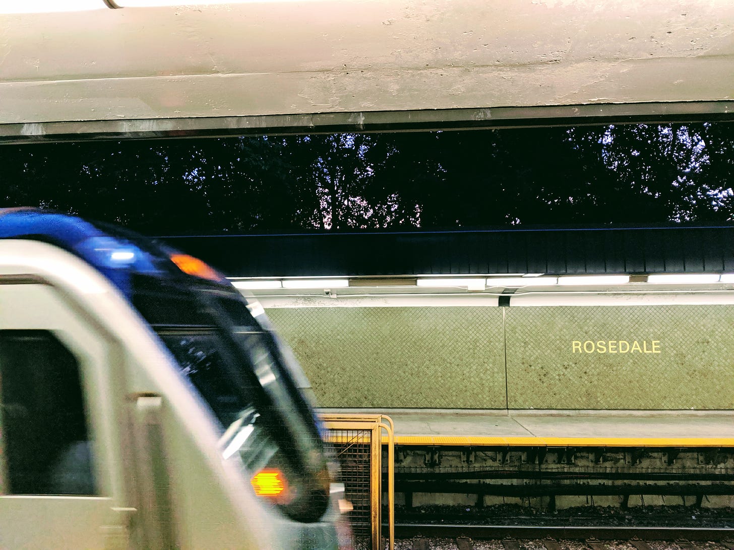 a train entering rosedale station in Toronto.