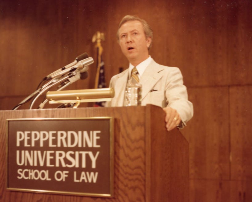 Dean Ronald Phillips at the podium, "The Reagan Seminar," Jan. 12, 1979, Pepperdine University Archives Photograph Collection:
https://pepperdine.contentdm.oclc.org/digital/collection/p271401coll15/id/8730/rec/83