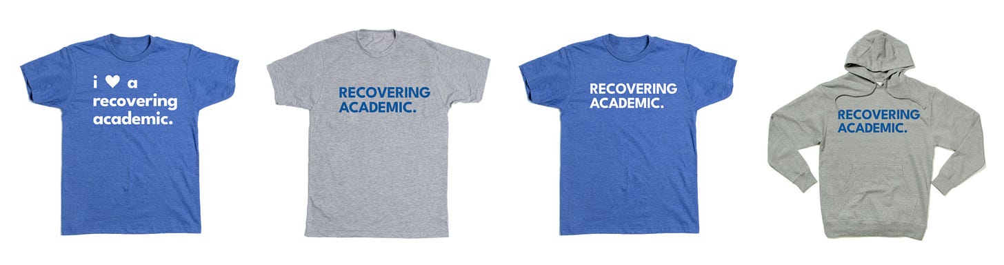 T-shirts with the logos "i ❤️ a recovering academic" and "RECOVERING ACADEMIC"