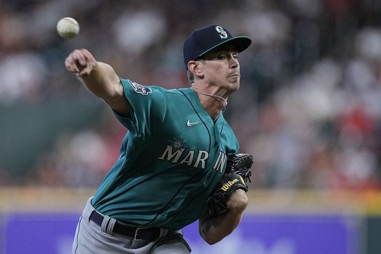 Seattle Mariners starting pitcher Emerson Hancock delivers during the first inning of a baseball game against the Houston Astros, Sunday, Aug. 20, 2023, in Houston. (Kevin M. Cox / The Associated Press)