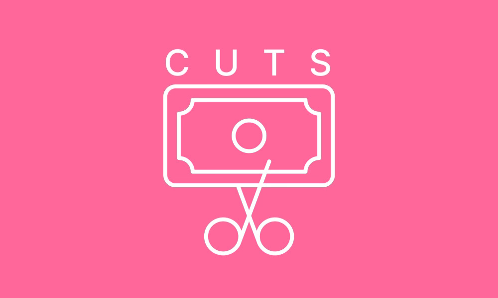 Line art illustration of scissors cutting a dollar bill