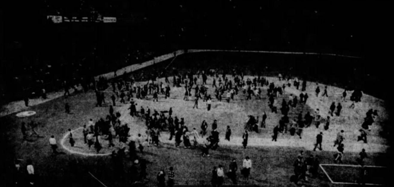 White Sox fans on Comiskey Park infield.