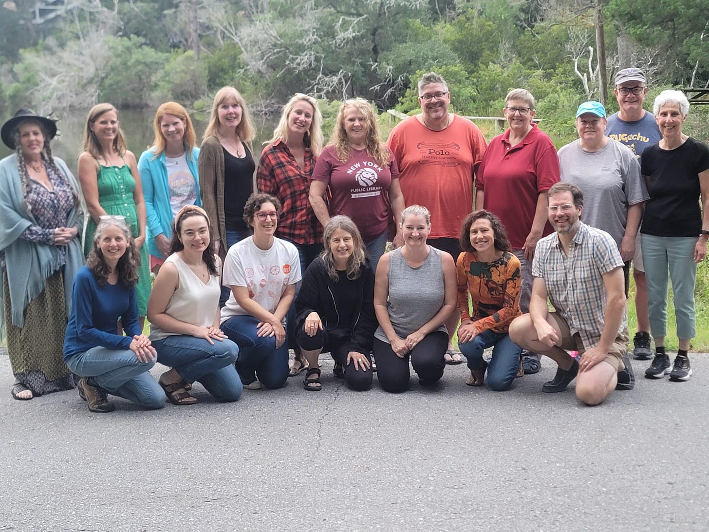 two rows of smiling white people