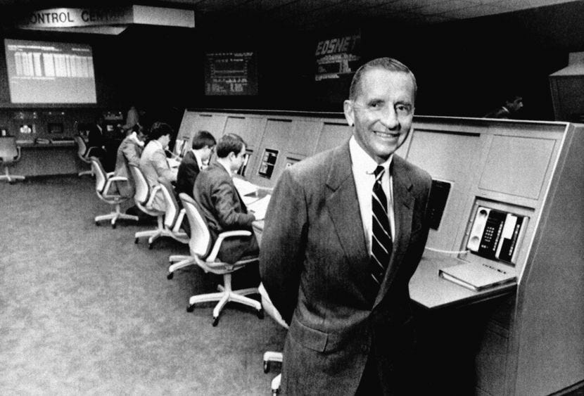 In this 1985 photo, Ross Perot shows off the company's newest information processing center...