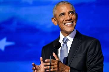 Barack Obama making small  crowd gesture with his hands at DNC.