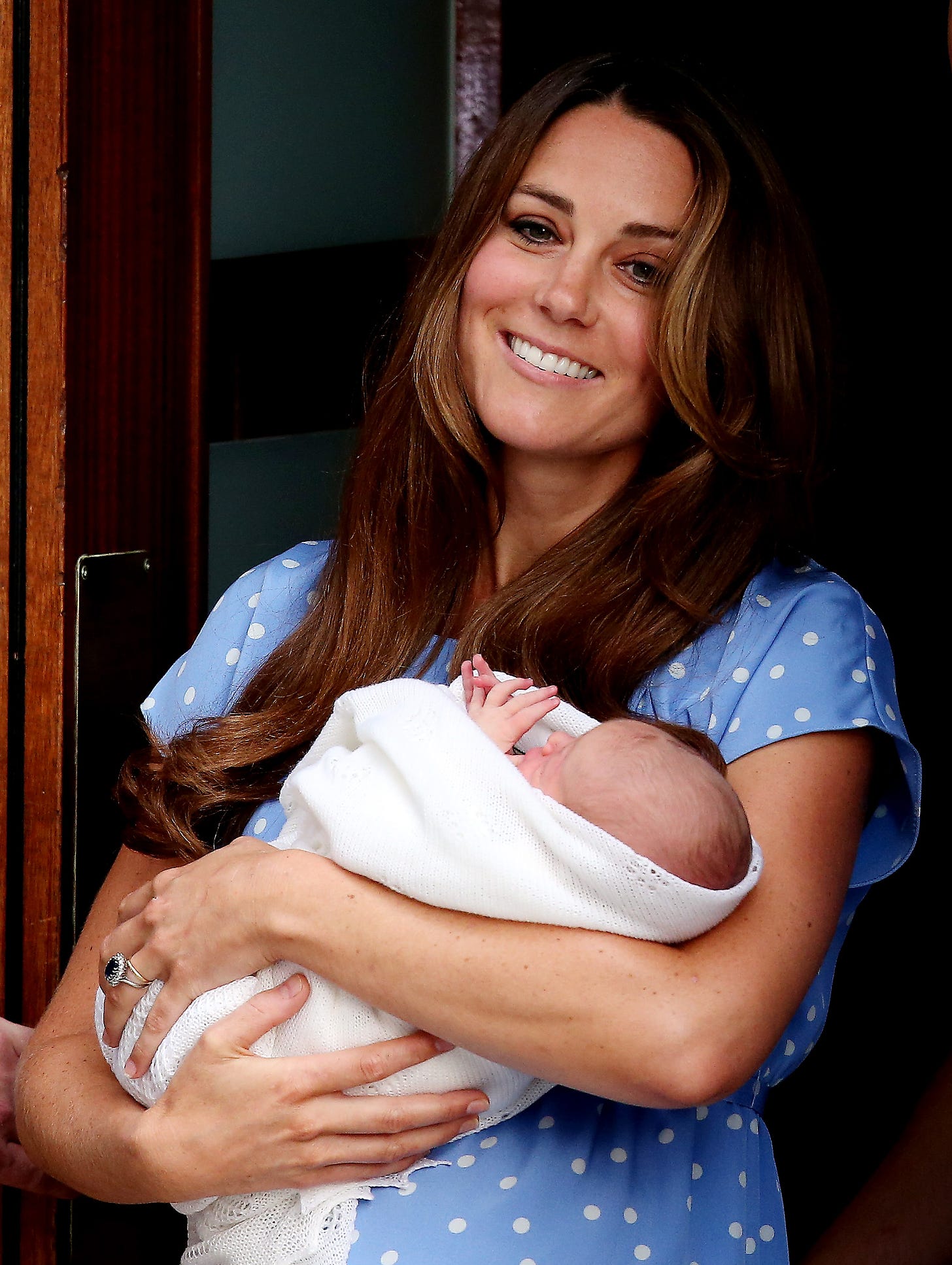 princess kate holding one day old prince george