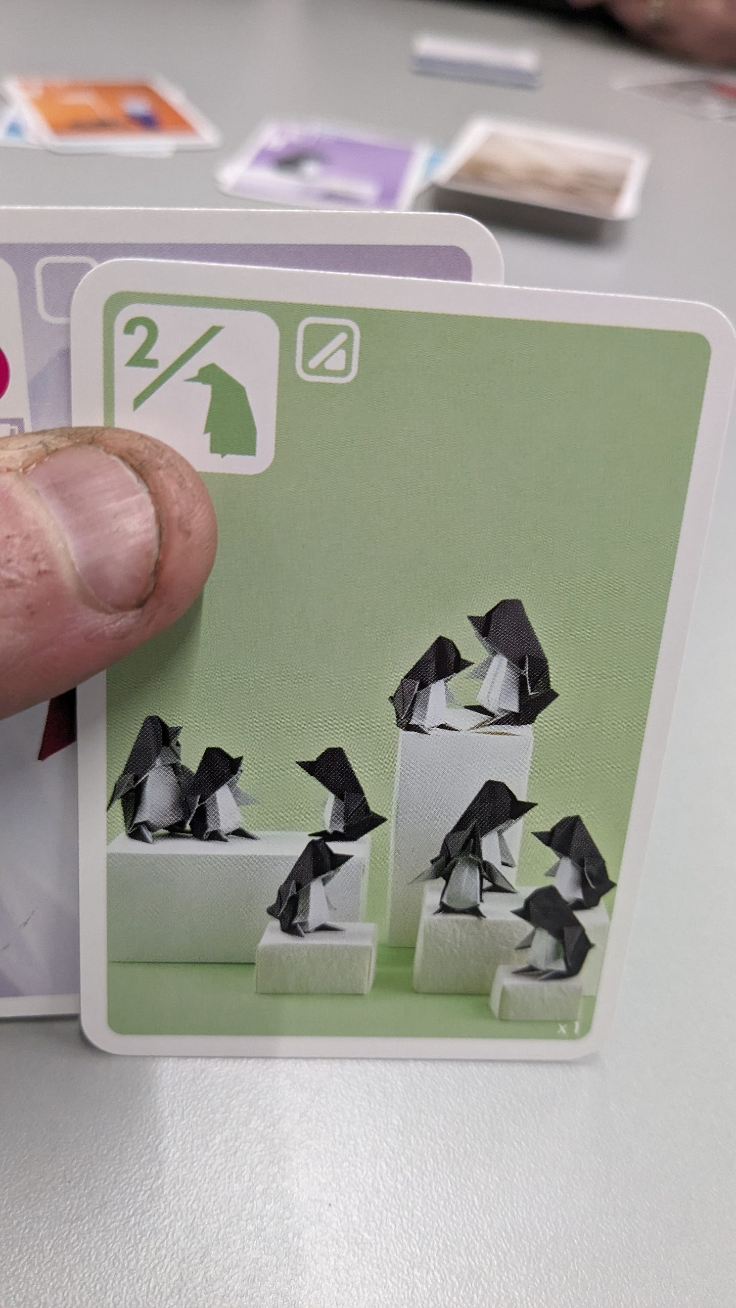 The group of penguins card from Sea, Salt, and Paper