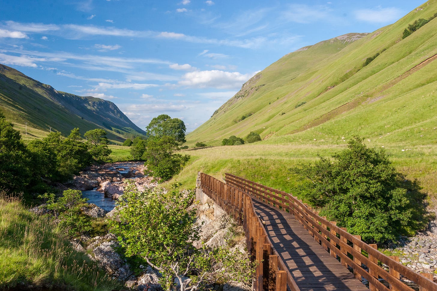 A footbridge over the river in Glen Tilt, Perthshire © Felicity Martin