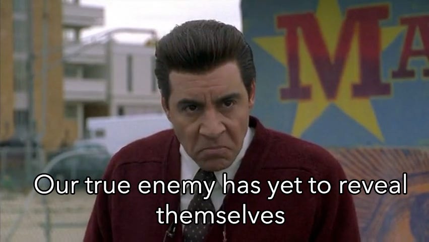 Screenshot of Silvio from The Sopranos. Caption reads 'Our true enemy has yet to reveal themselves'