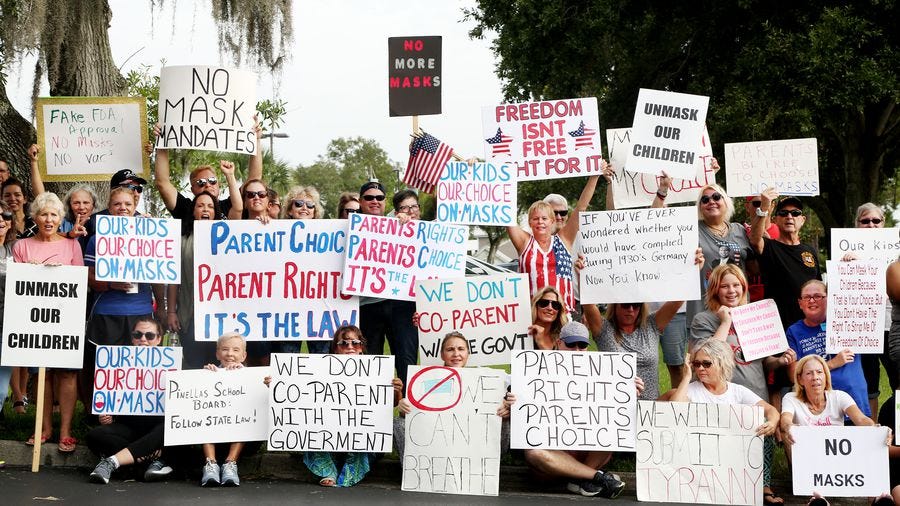 Families who oppose mask mandates gathered outside Pinellas County school district headquarters in Largo before an Aug. 24 School Board meeting. The recent push for parents' rights has expanded beyond masks to include other issues.