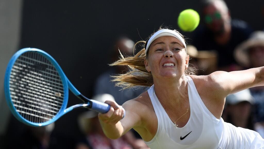 Russia’s Maria Sharapova in action during her first round match against France’s Pauline Parmentier. Photograph: Toby Melville/Reuters