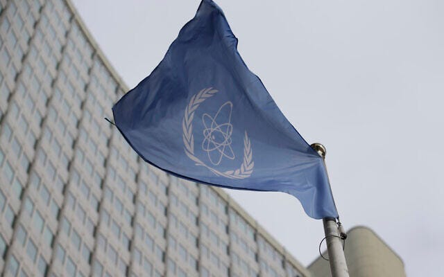 The flag of the International Atomic Energy Agency flies in front of its headquarters during an IAEA Board of Governors meeting in Vienna, Austria, on February 6, 2023. (Heinz-Peter Bader/AP)