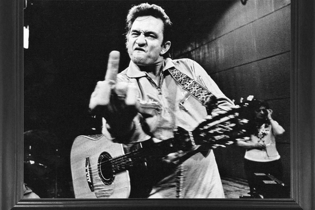 The History Behind the Famous Johnny Cash Middle Finger Photo