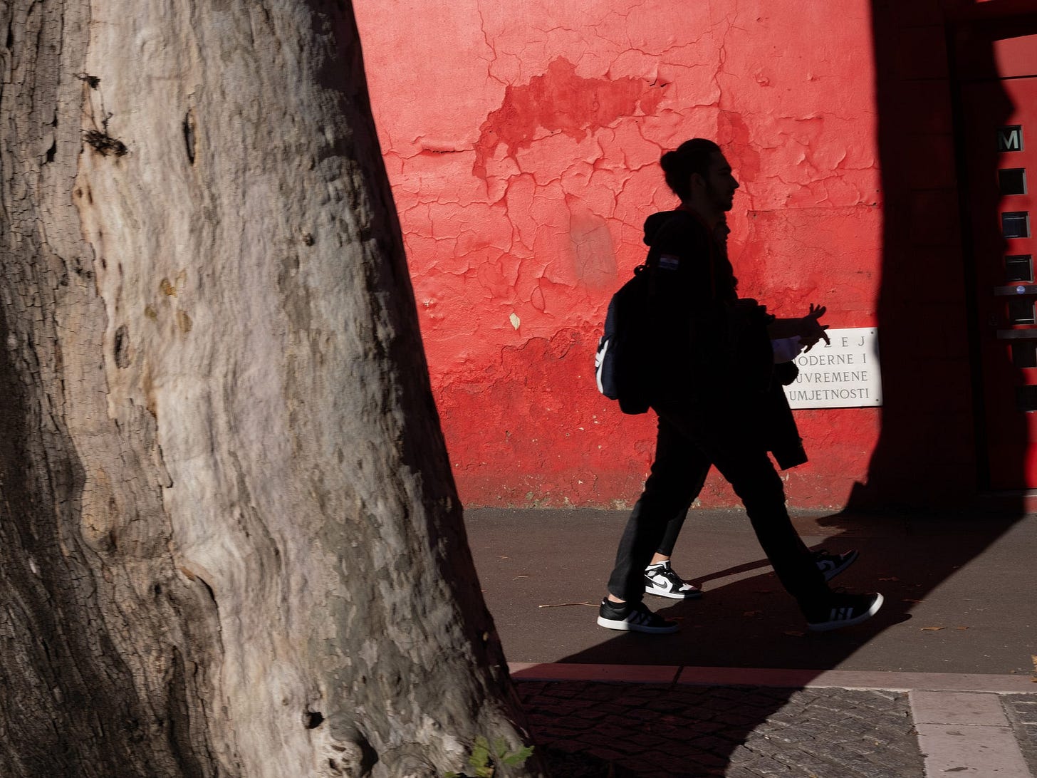 Pedestrians walking in the city of Rijeka, Croatia.