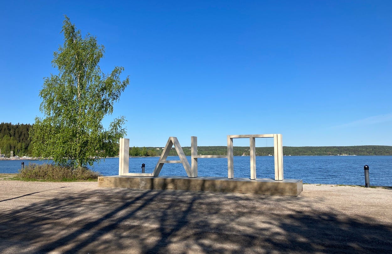 Large sign says LAHTI in front of the water