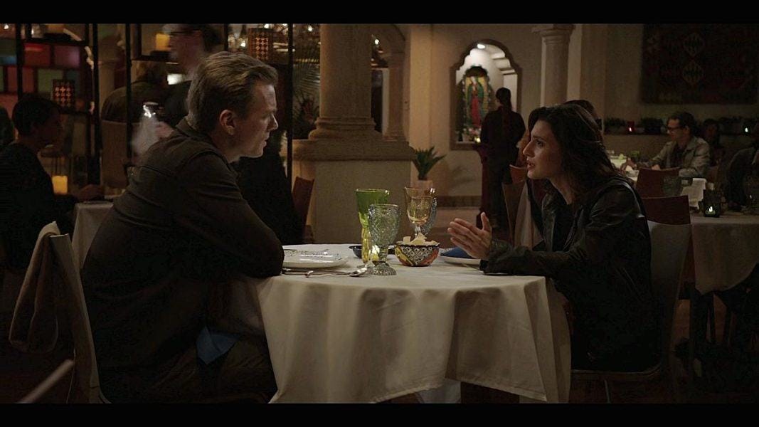 Wide shot of Jake Abel Kevin with Cassie at restaurant on Walker set 3.09.