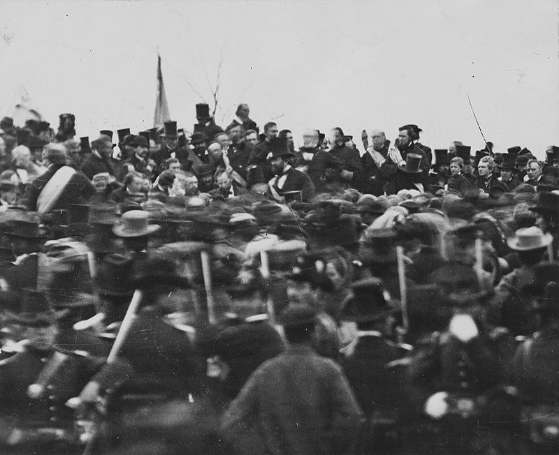 A black and white photo of a crowd at Gettysburg in 1863. 