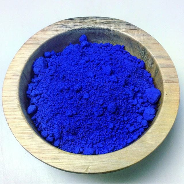 A bowl of brilliant sarum blue powder