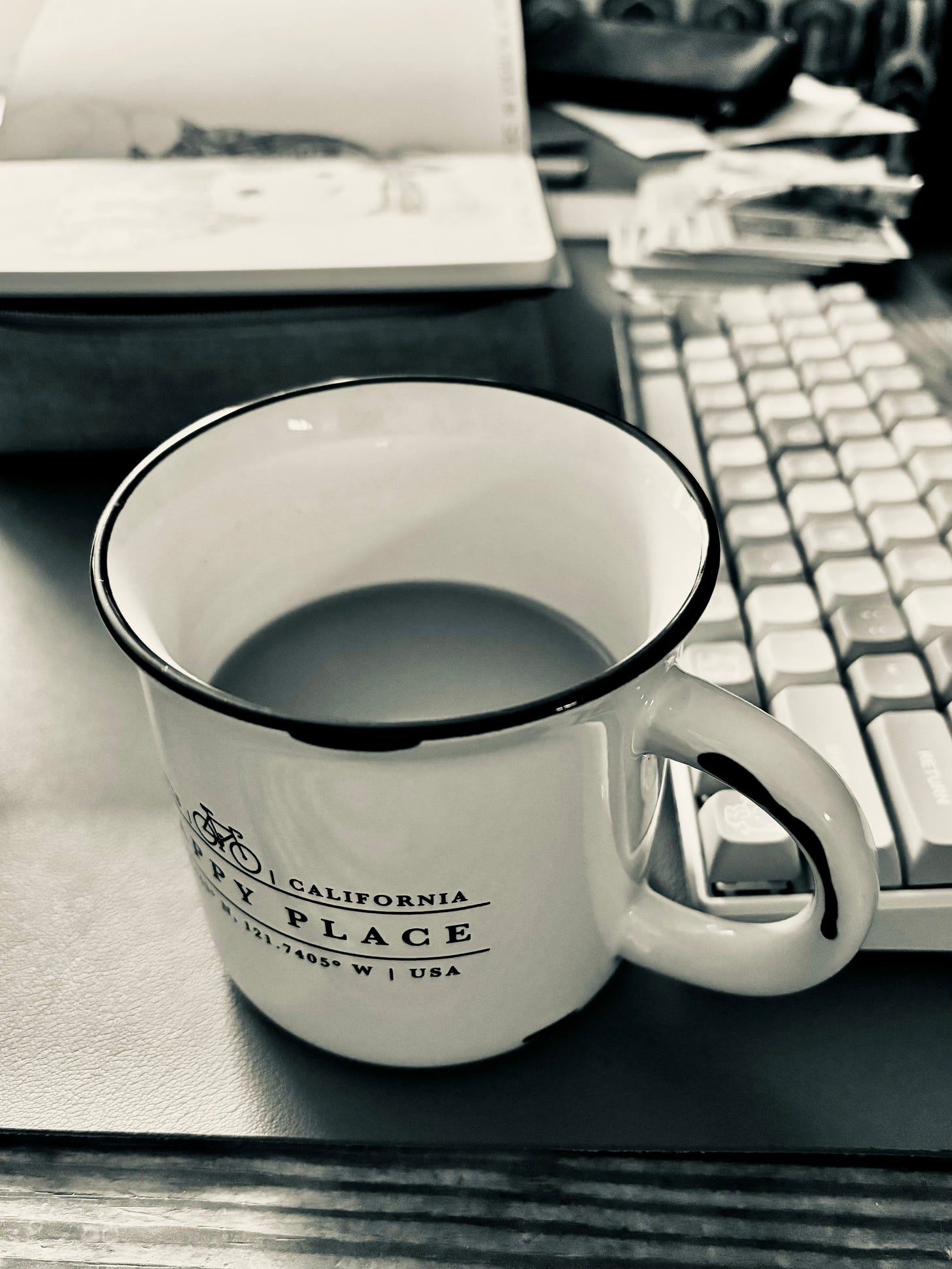 Coffee cup and keyboard