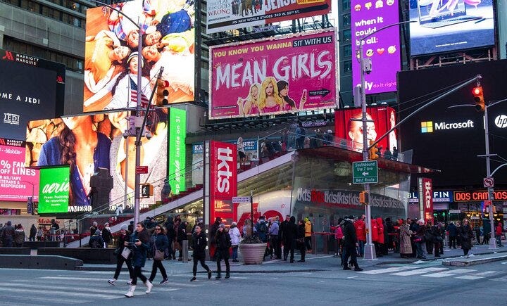 Tourists explore Times Square in New York.