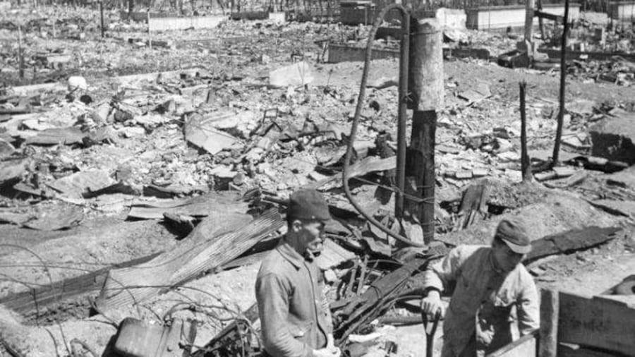 A photo taken March 19, 1945, shows the incendiary bomb-devastated Kameido district after a firebombing raid, as seen from Kameido Tenjin Bridge. [Associated Press / The Center of the Tokyo Raids and War Damage]