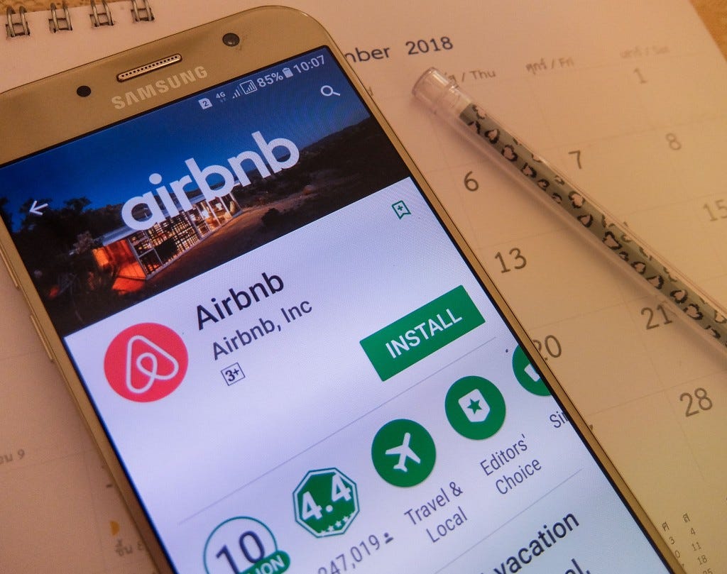 An Airbnb app on a cell phone.