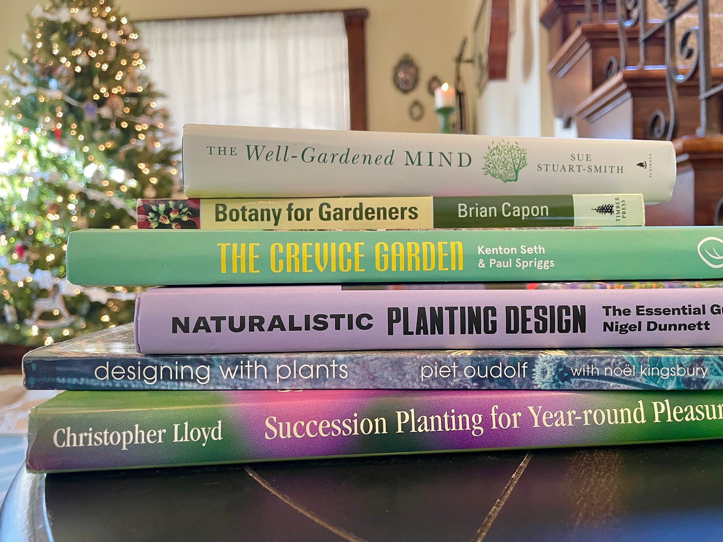 A favorite stack of gardening books by our Christmas tree this year :)