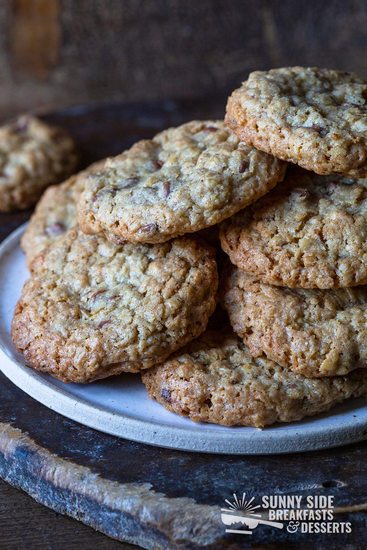 A plate of oatmeal peanut butter chocolate chip cookies.