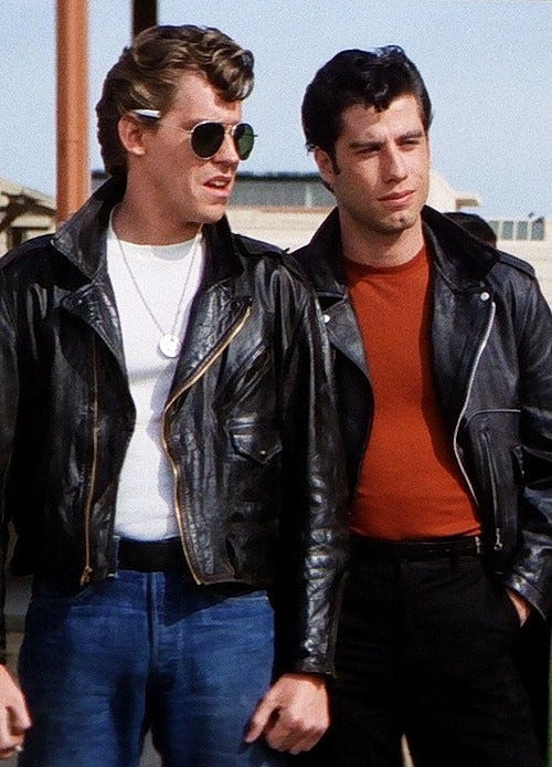 Jeff Conaway (Kenickie) and John Travolta (Danny Zuko) | Grease movie,  Grease outfits, John travolta