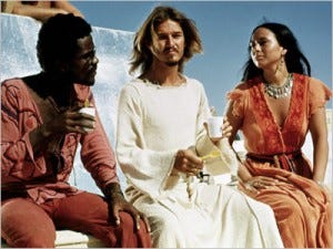 Judas, Jesus, and Mary Magdalene relaxing on set