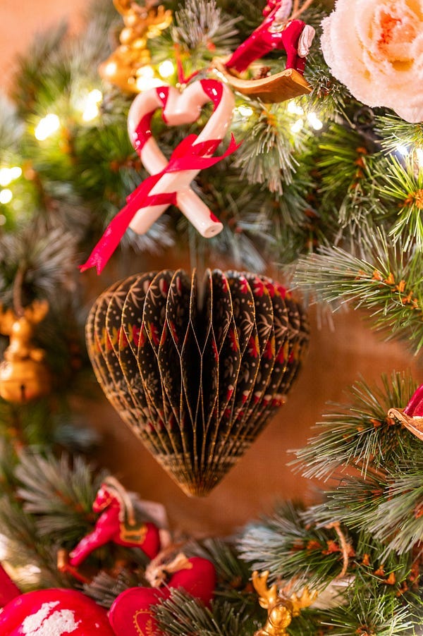 An acorn decoration on a Christmas tree