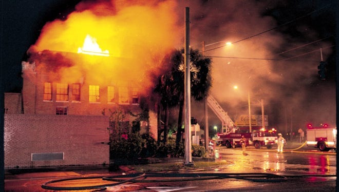 In the early morning hours of April 20, 1996 firefighters struggled to save the historic Coca-Cola building at the corner of Cleveland and Edison avenues. Their efforts were unsuccessful as the 67-year-old building was destroyed in the arson fire. The destruction was later tied to a spree of crimes, including the killing of Riverdale High band director Mark Schwebes, committed by the Lords of Chaos.