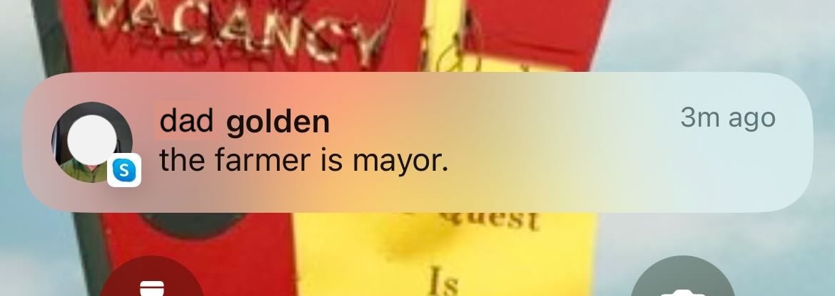 Skype notificatoin from dad golden reads "the farmer is mayor"