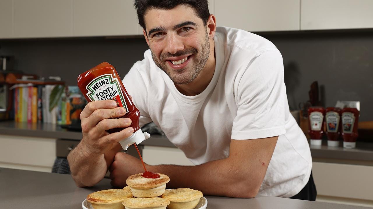 AFL fans prefer food at home over stadium food as Christan Petracca  launches Heinz Footy Ketch-Cup | Herald Sun