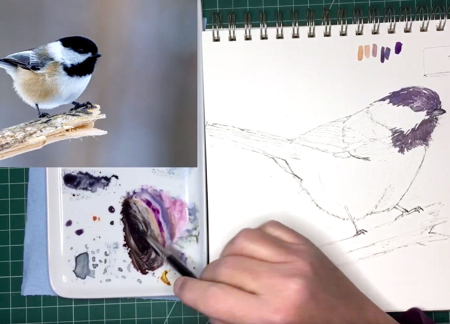 mixing black watercolor paint