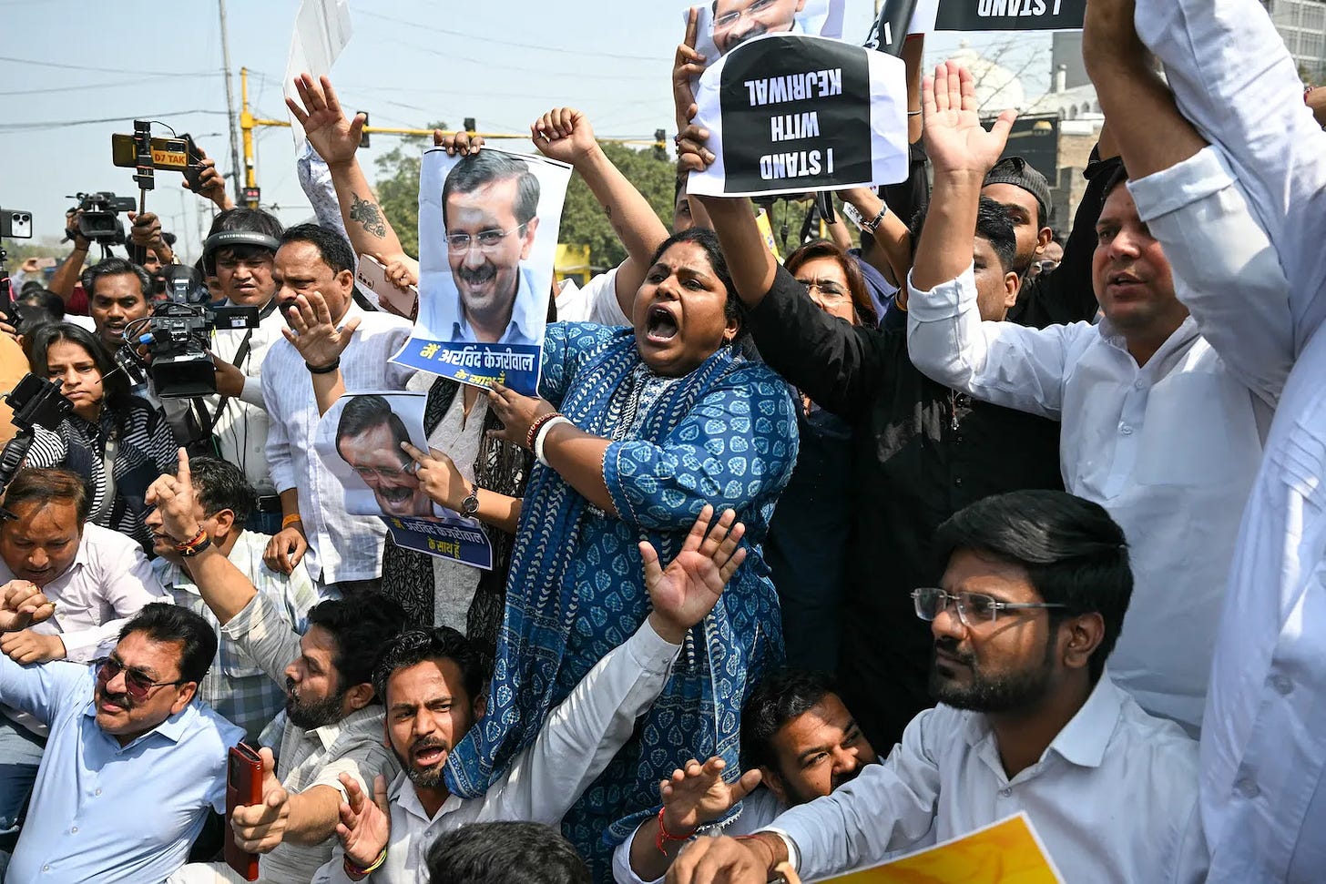 People protest the arrest of Delhi Chief Minister Arvind Kejriwal in New Delhi.