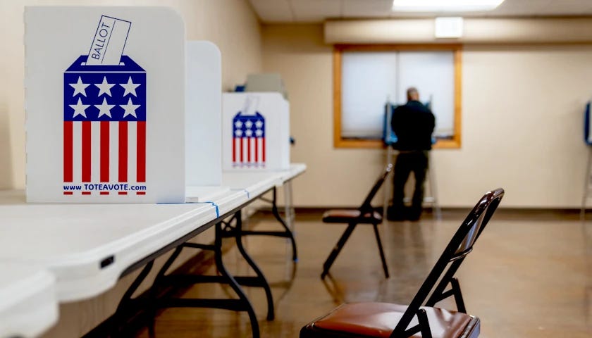 Photo “Person Voting” by Lorie Shaull. CC BY 2.0. Photo “Person Voting” by Lorie Shaull. CC BY 2.0.