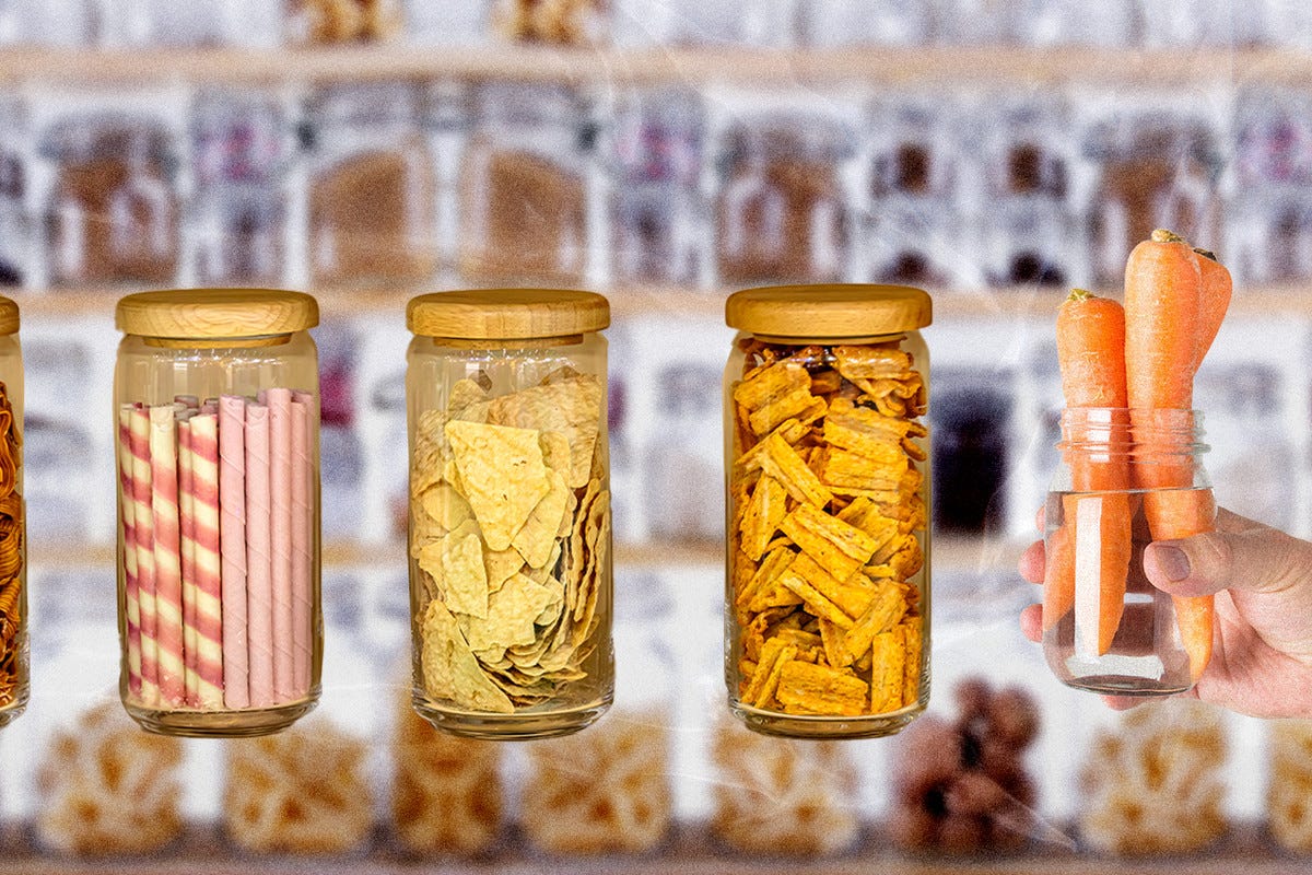 Glass jars filled with chips, snacks, and carrots. Photo illustration.