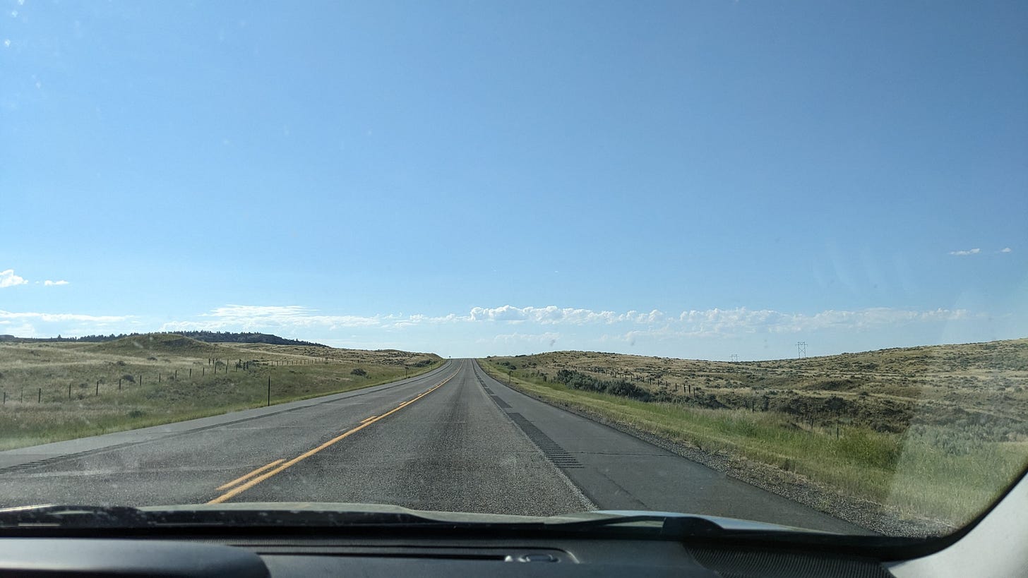 a shot of the front window into the open landscape of wyoming