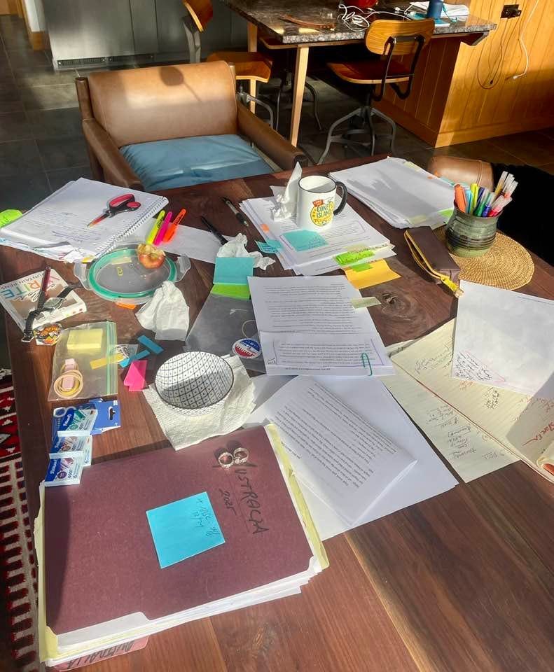 May be an image of studying and table