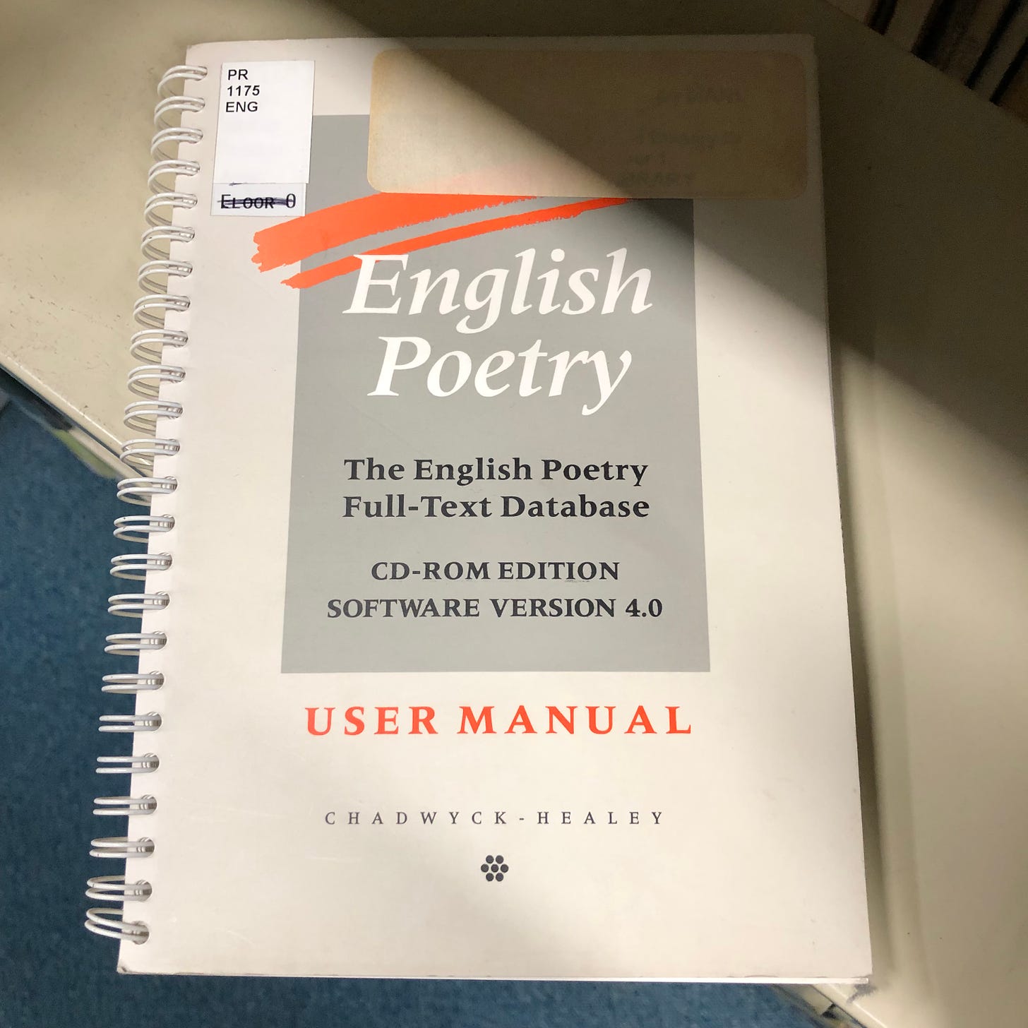 Photo of spiral-bound English Poetry database user manual