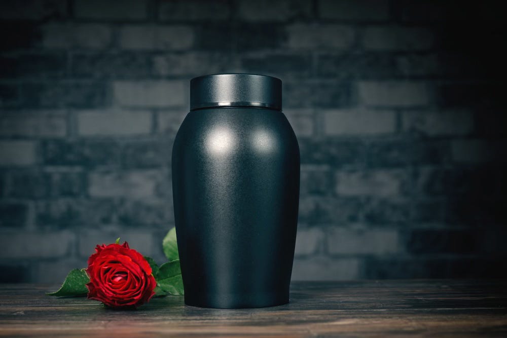 Urn for cremains with red rose